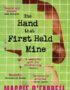 The hand that first held mine
